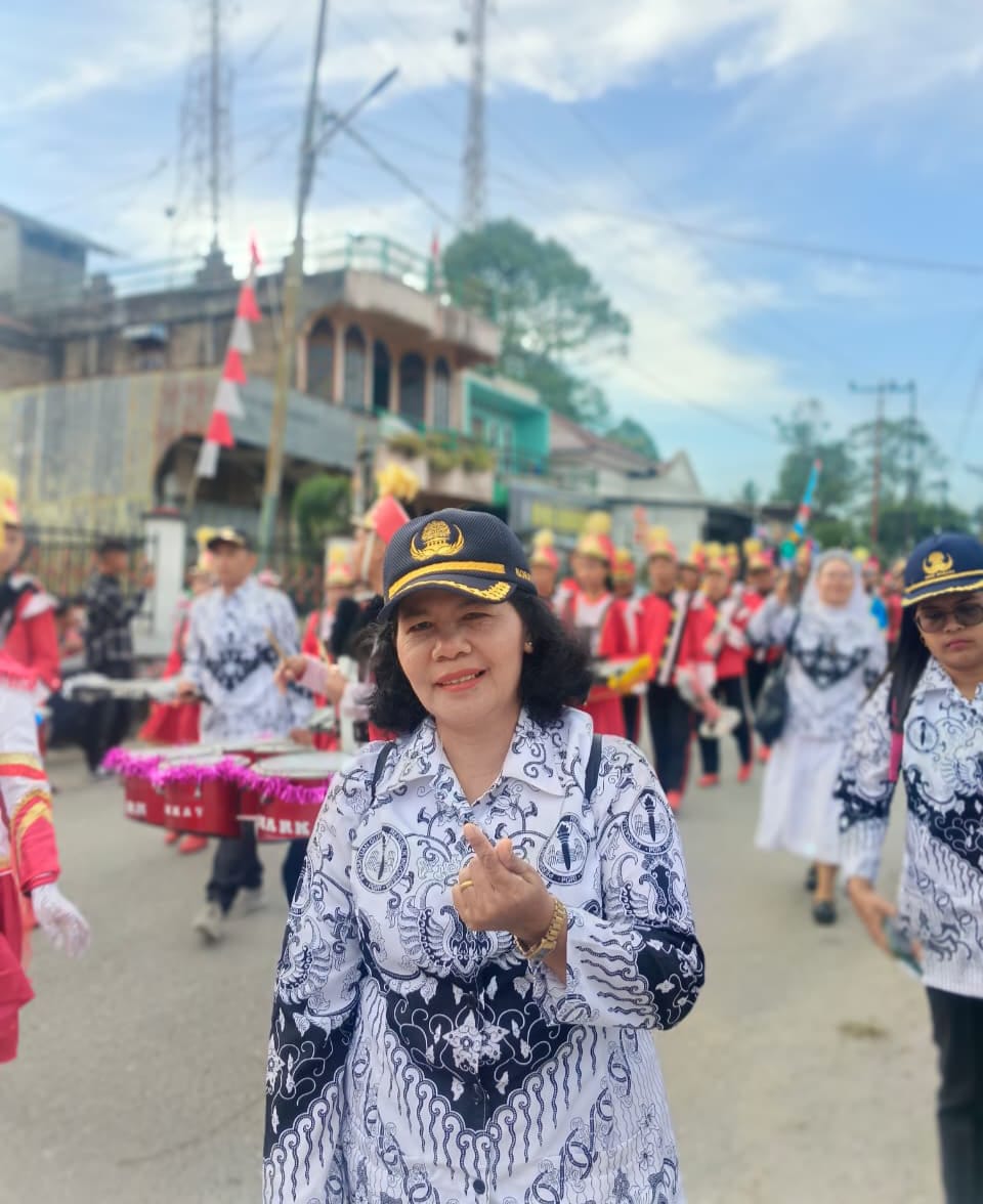 N. Simanullang, S.Pd