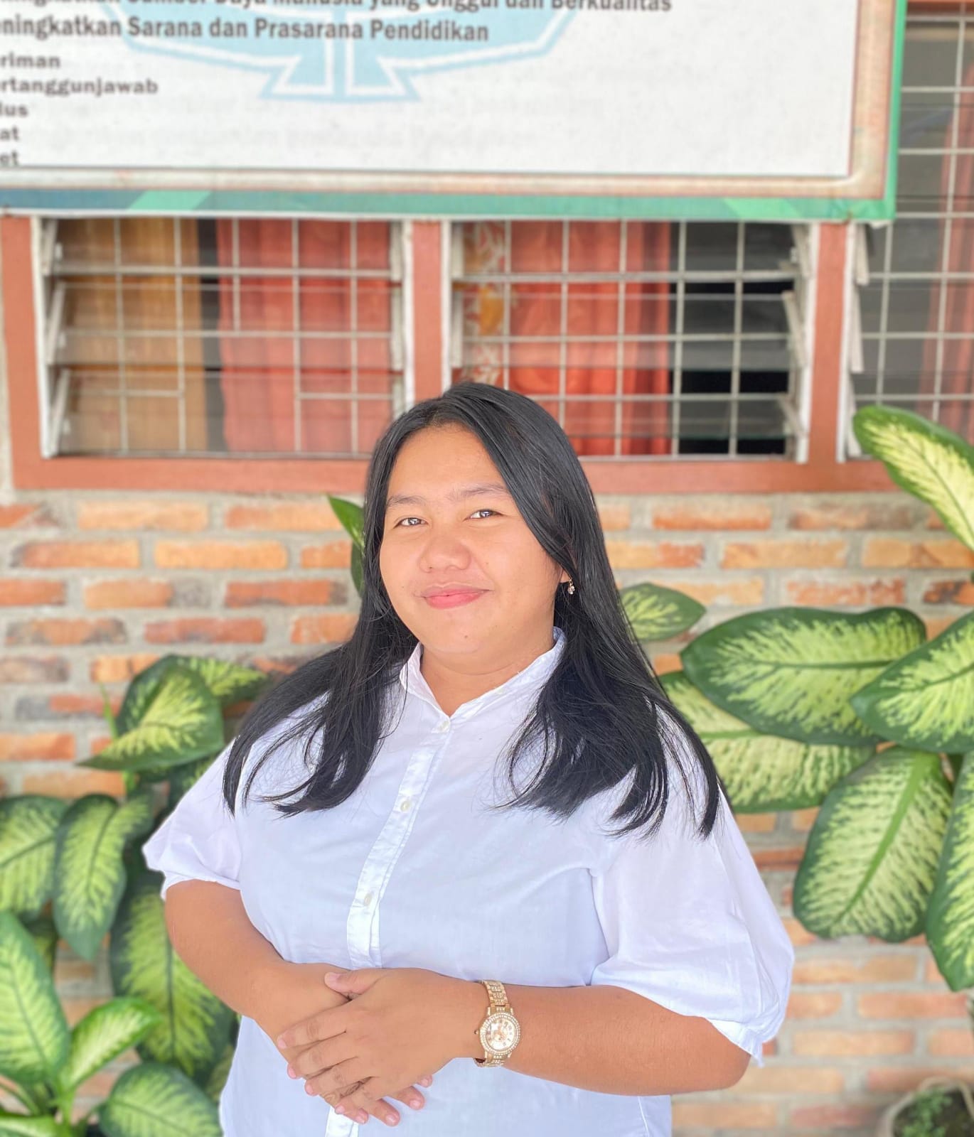Titania Tinambunan, S.Pd